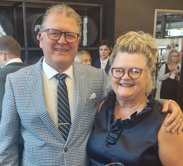 Arlan Swenson with his wife Karla at a community event